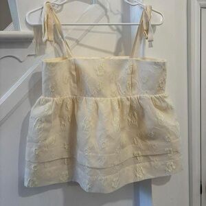 Elegant Cream Hunter Bell Sleeveless Top